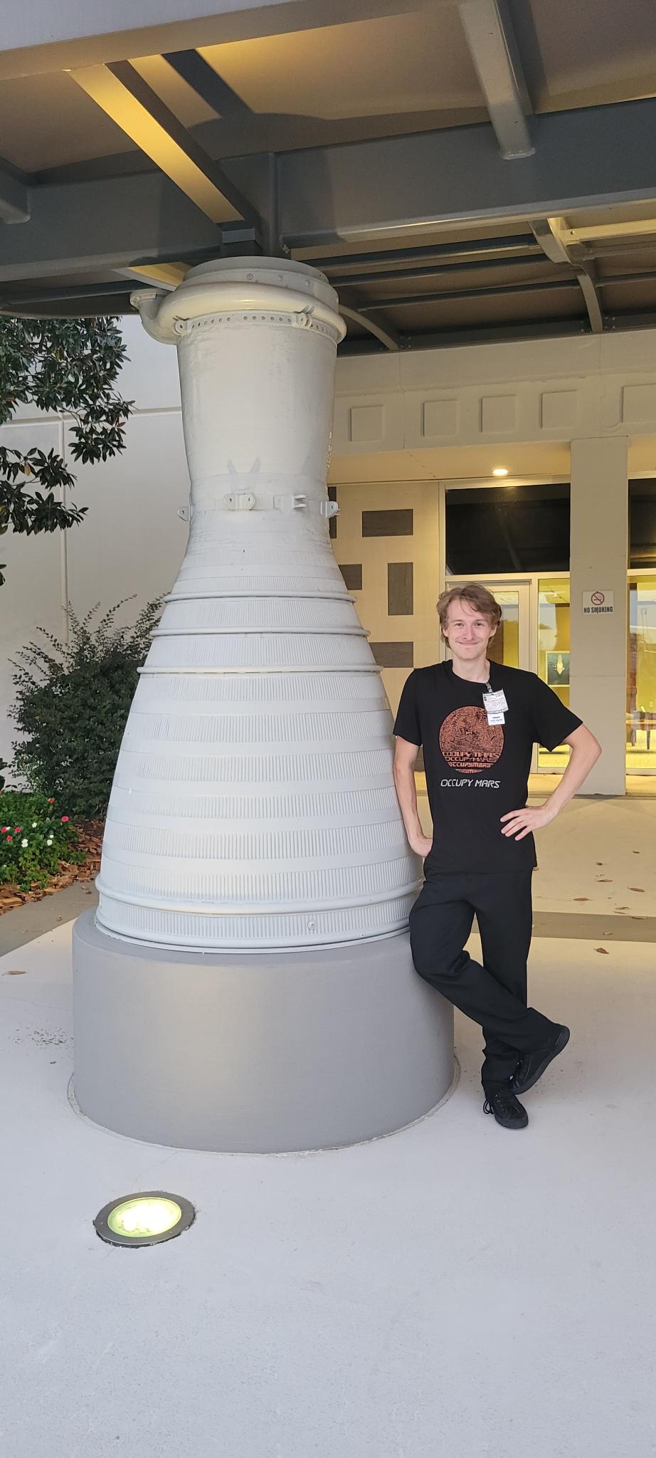 Photo with a rocket engine before visiting the Stennis A1 test stand